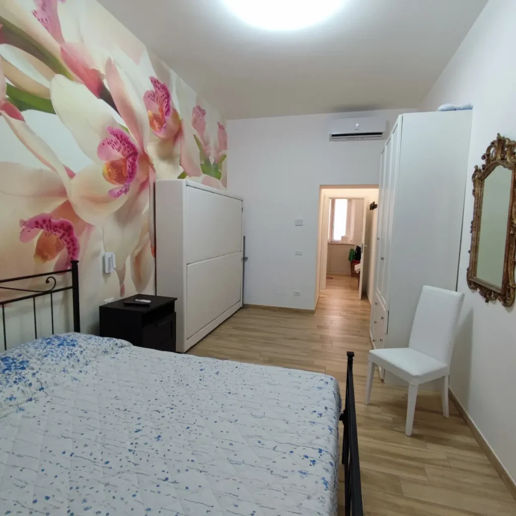Camere Quadruple per Famiglie Roma camera 2 orchidea vista dalla finestra